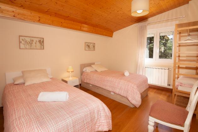 15 HABITACION CAMAS SIMPLES